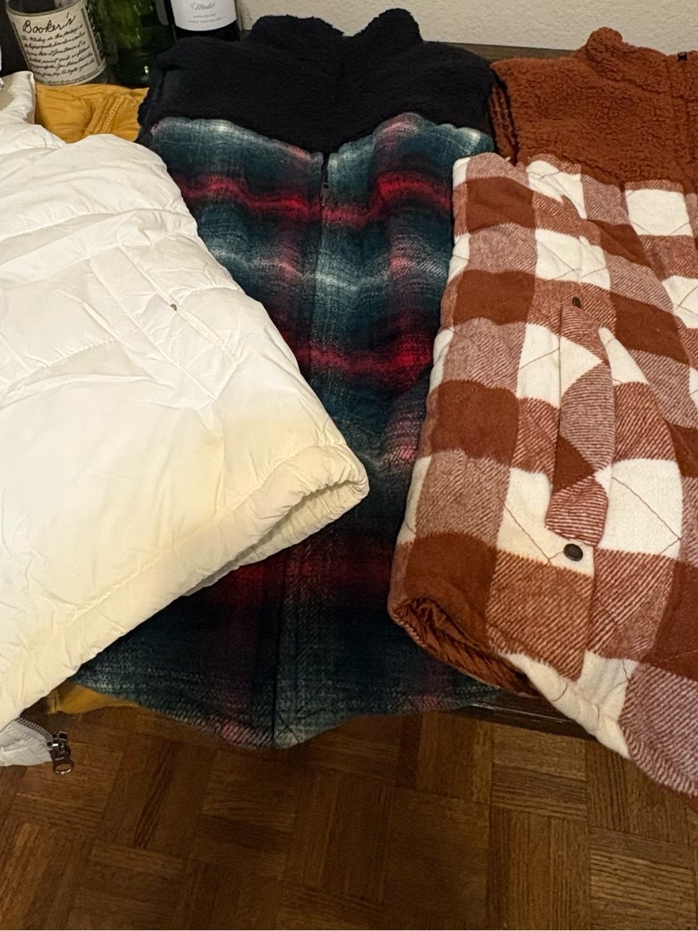 Multicolored puffer vests. #layer #winter